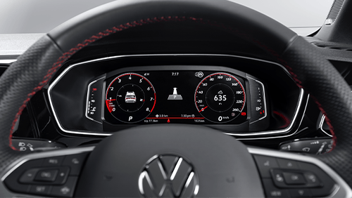 Volkswagen Taigun digital instrument cluster with red stitched steering